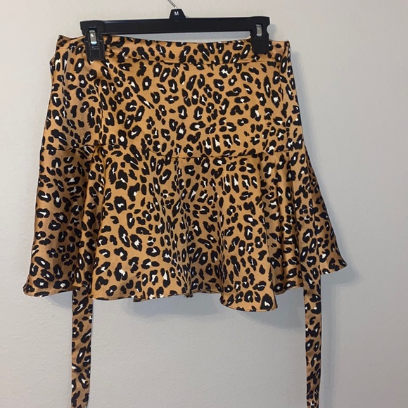 Mini skirt 
Brand: glam
Color: cheetah 
Size: large - Picture 1 of 7